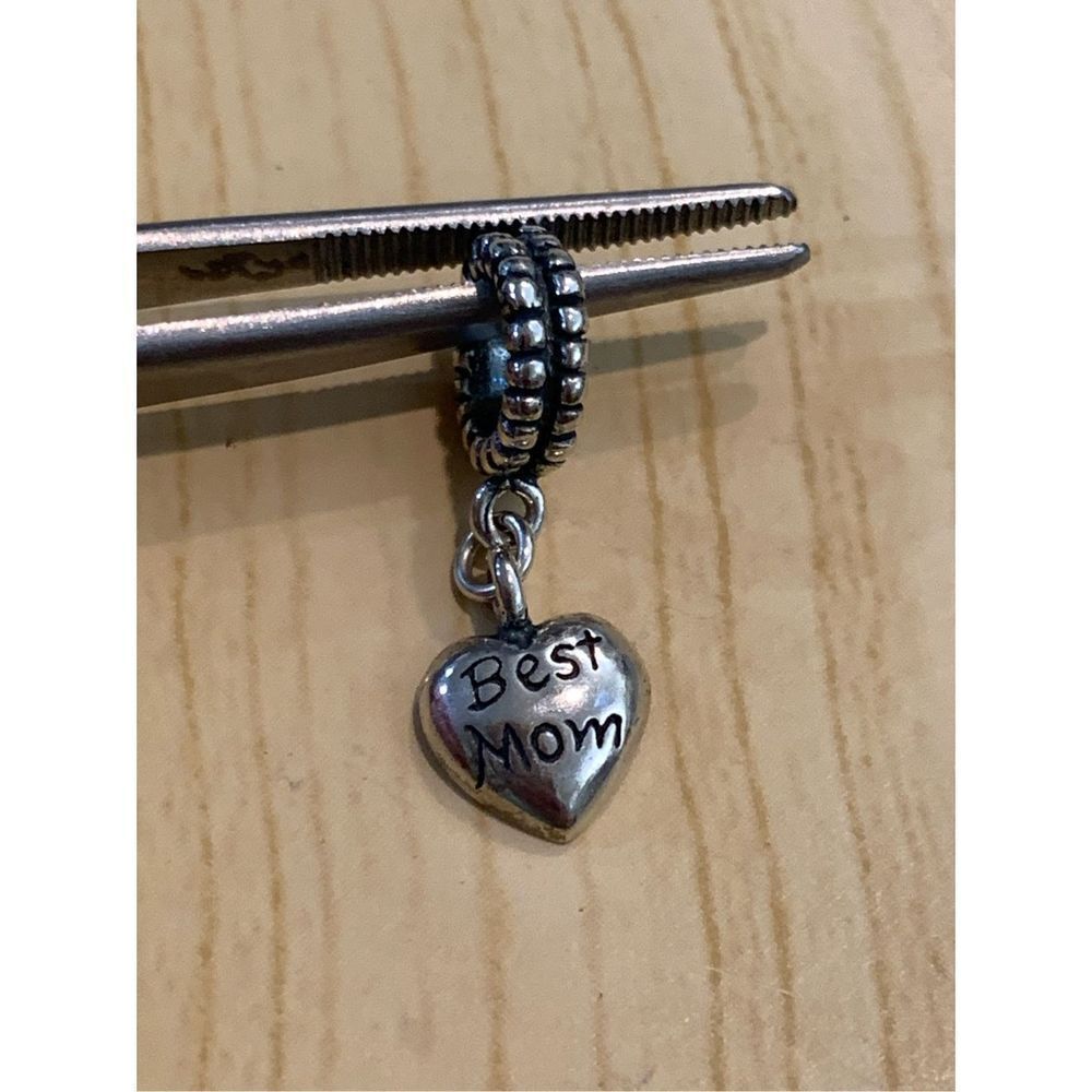 .925 Heart Best Mom dangling from Ornate Ring Sterling Silver Jewelry Charm